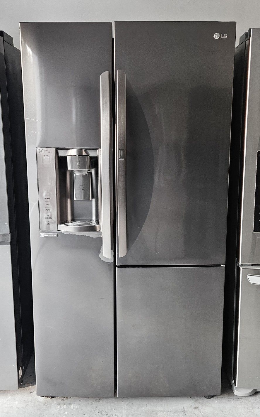 Black Stainless steel LG Side-By-Side refrigerator. Everything works great.