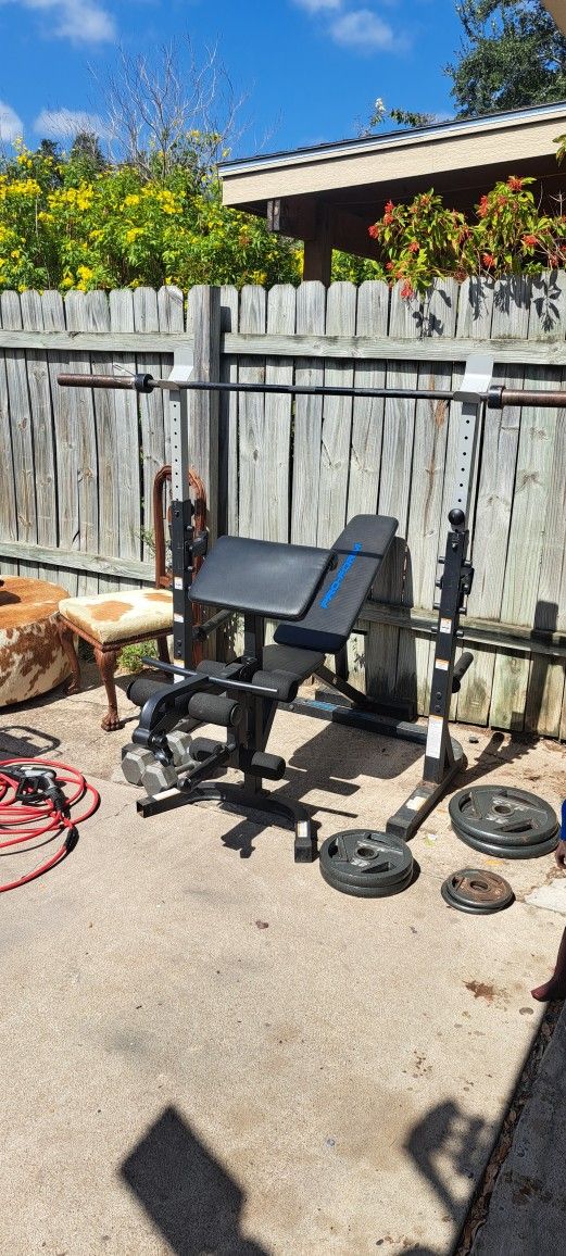 banca squat rack barra olimpica 2 discos de 35lb 2 discos de 25lb 2 discos de 5 lb 2amciernas de 35 lb