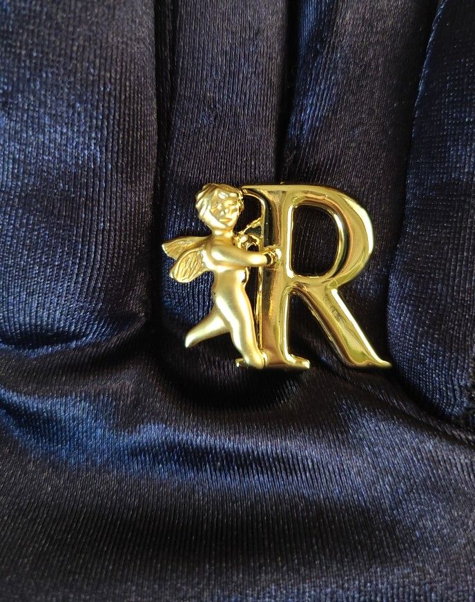 L. Razza Angel Holding Letter R Brooch