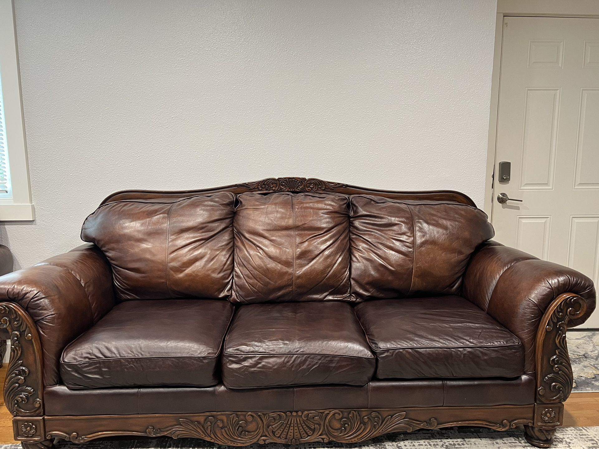 2 leather sofas 