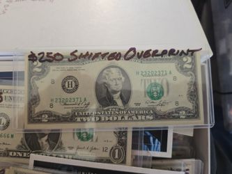 1976 $2 note with major shifted overprint .