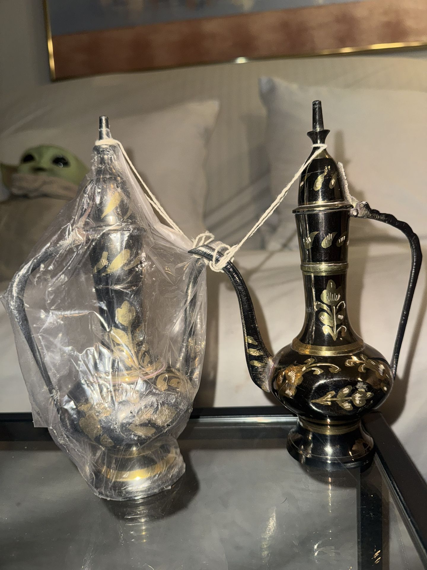 brass teapot or kettle. often handcrafted and can be used for serving tea.