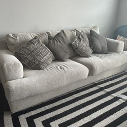 Like-New Sofa with 4 Pillows