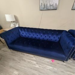 Royal blue velvet couches