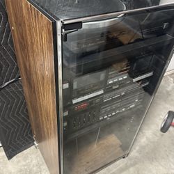 Vintage Fisher Stereo System With Glass Cabinet .  It all powers on fine, No Speakers,  All in Beautiful Condition 