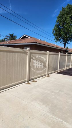 Tan Vinyl Fence