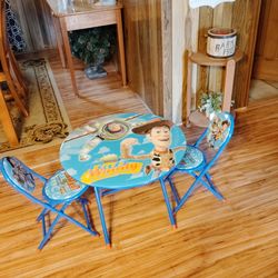 Brand new toy story three piece table and chairs
