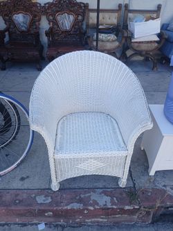 white wicker armchair
