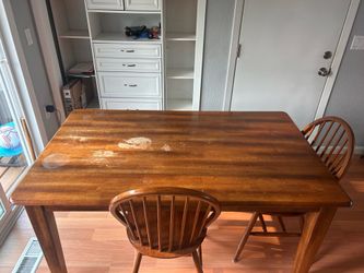 Table with bench and 3 chairs