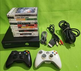 Microsoft Xbox 360 slim with 2 controllers 12 games HDMI cord power supply