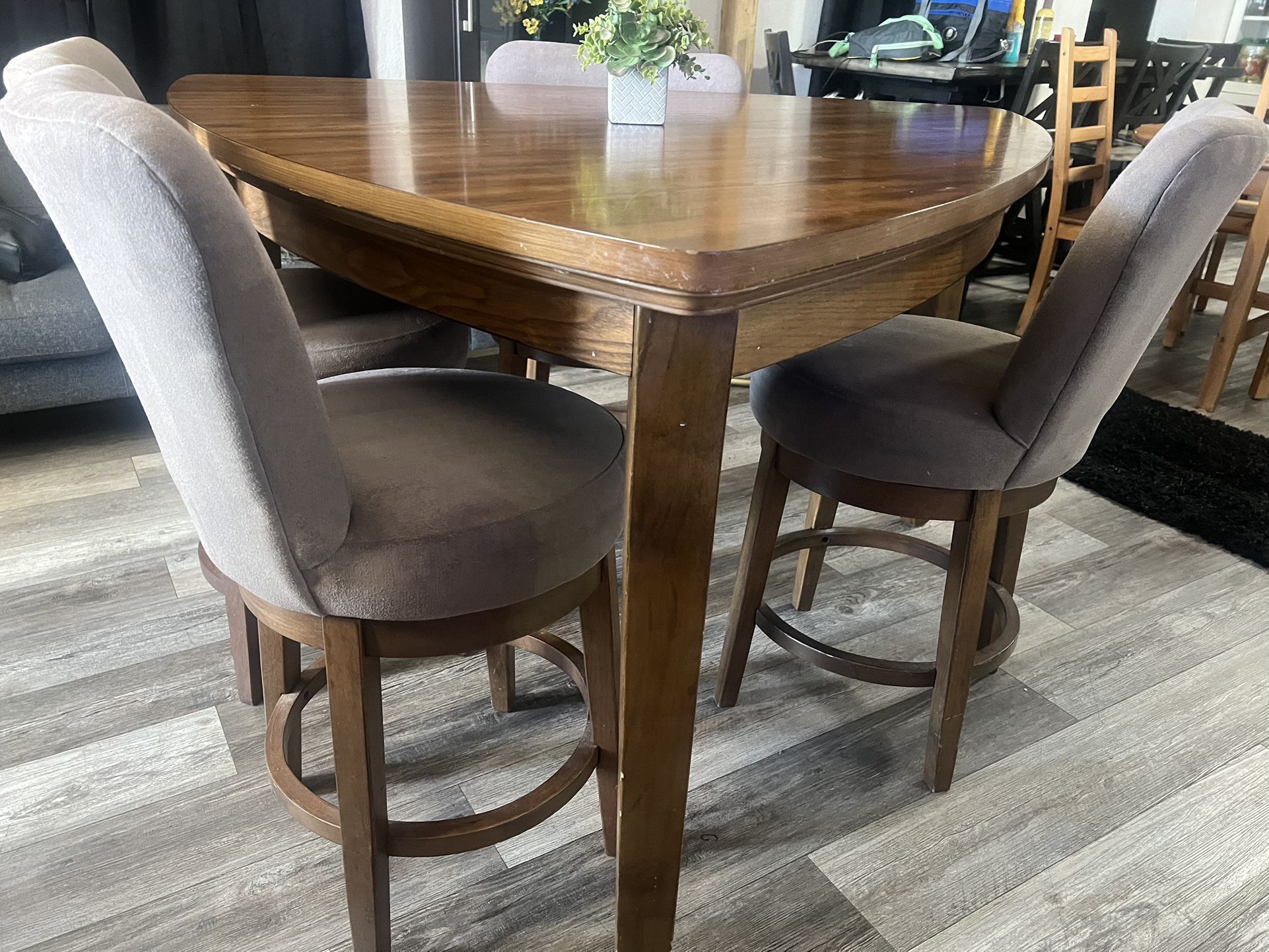 Table And Swivel Chairs