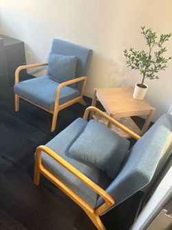 2 blue accent chairs and side table