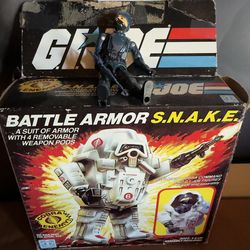 1983 G.I. Joe Cobra S.N.A.K.E. Battle Armor & 1983 Vintage G.I. Joe Cobra Officer action figure.