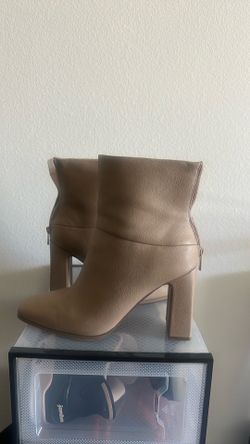 High-heeled tan ankle boots