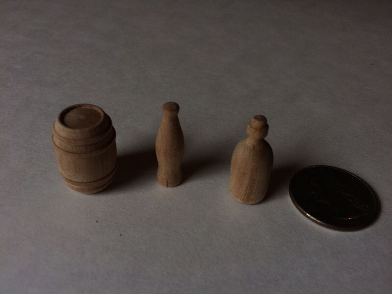 Small wooden barrels and bottles
