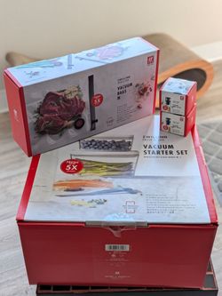 Brand new Zwilling 7 piece vacuum starter kit + 10 Medium size vacuum bags + 2 wine stopper kit