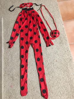 Miraculous lady bug costume size 5-7 years with accessories.