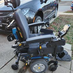 Electric Wheel Chair With Charger & Books