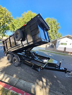 DUMP TRAILER 14X8X2 HEAVY DUTY 8 LUGS,SET RAMPS, ROLLING TARP, SPARE TIRE,SCISSOR HOIST 7 TON,TOOL BOX FOR ANY QUESTION TEXT ME PLEASE HABLO ESPAÑOL