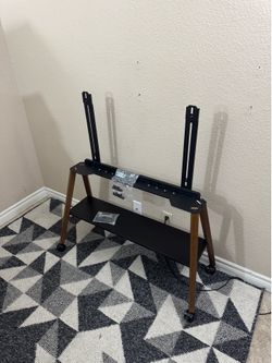 Rolling Tv  Stand up to 75in TVs