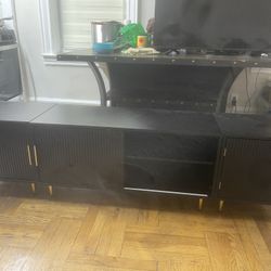 TV cabinet with two drawers, one on each side, in very good condition.