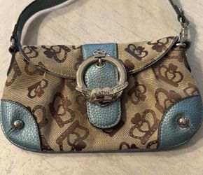 Kathy Van Zeeland shoulder bag with signature heart design. Clean interior, nice condition, and a cute vintage style. Ready to use.