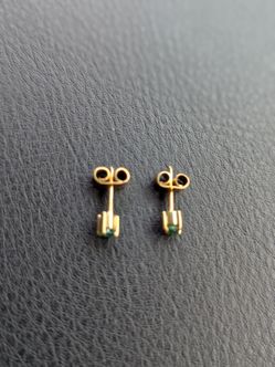 Small gold plated stud earrings with natural emerald gemstones