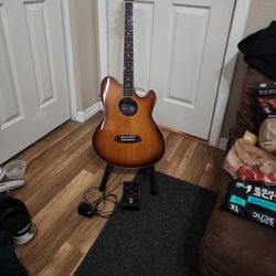 Ibanez Acoustic Electric Guitar With A Built In Tuner And a Trio Band Creator