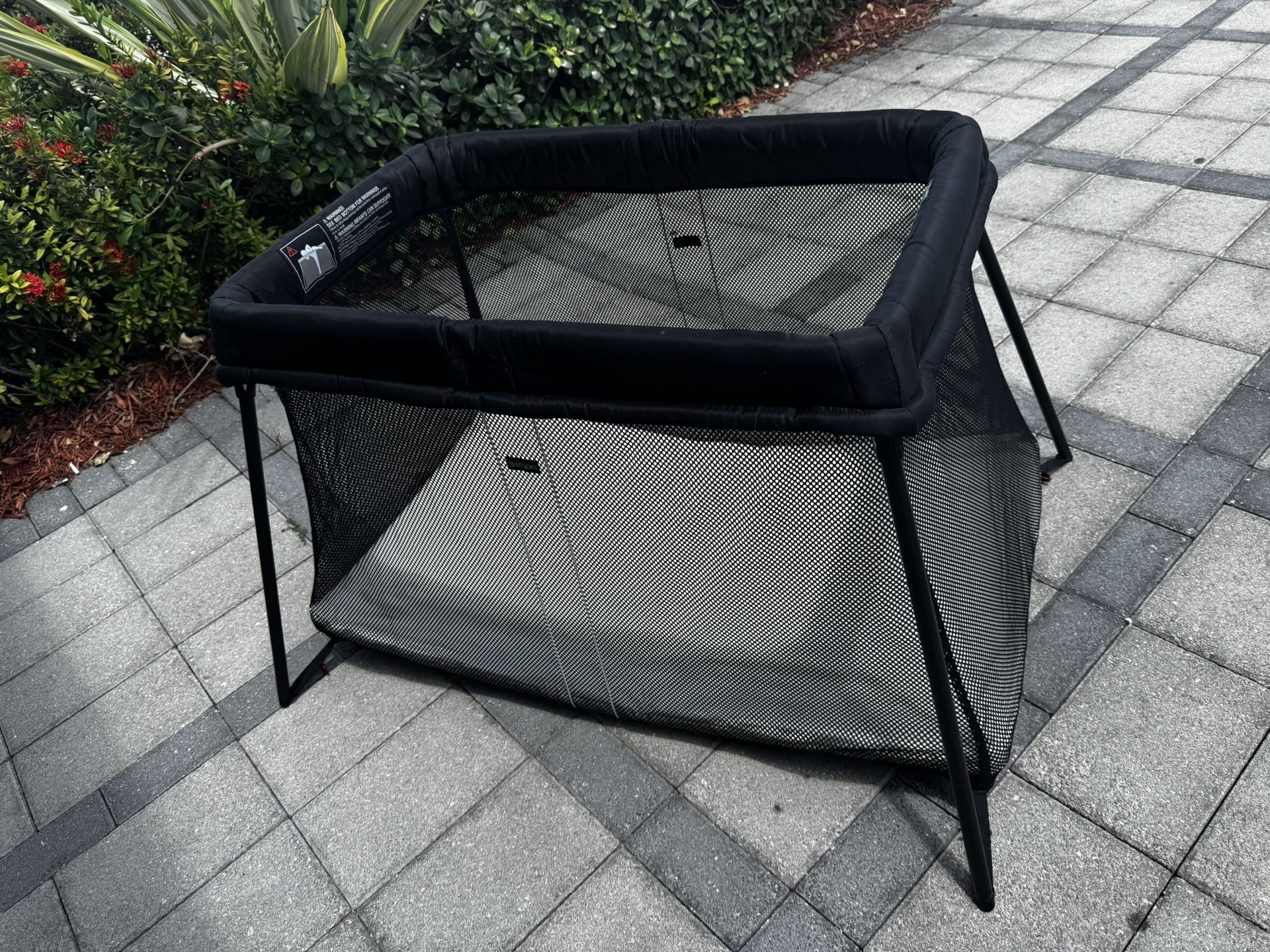 Babybjorn Travel Crib in Black Mesh Includes Travel bag and two fitted sheets Like new condition