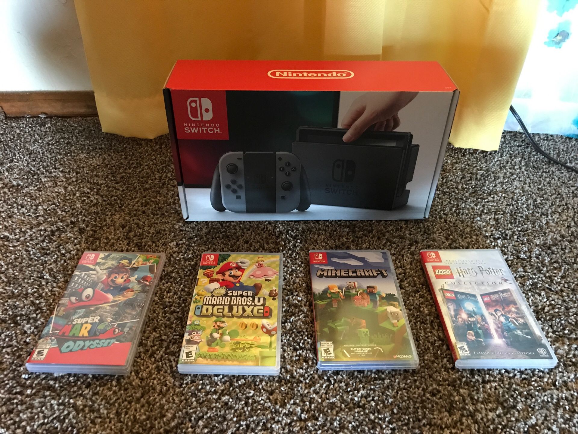 Nintendo Switch and 4 Games