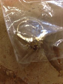Gold colored with stone ring