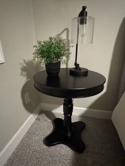 Black round end table