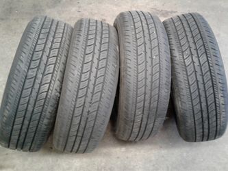 TIRES 185 65 14 MATCHING SET OF FOUR ALL IN GOOD CONDITION WILL MOUNT AND BALLANCE ALL 4..150.00
