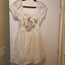 White eyelet lace dress with ruffle hem