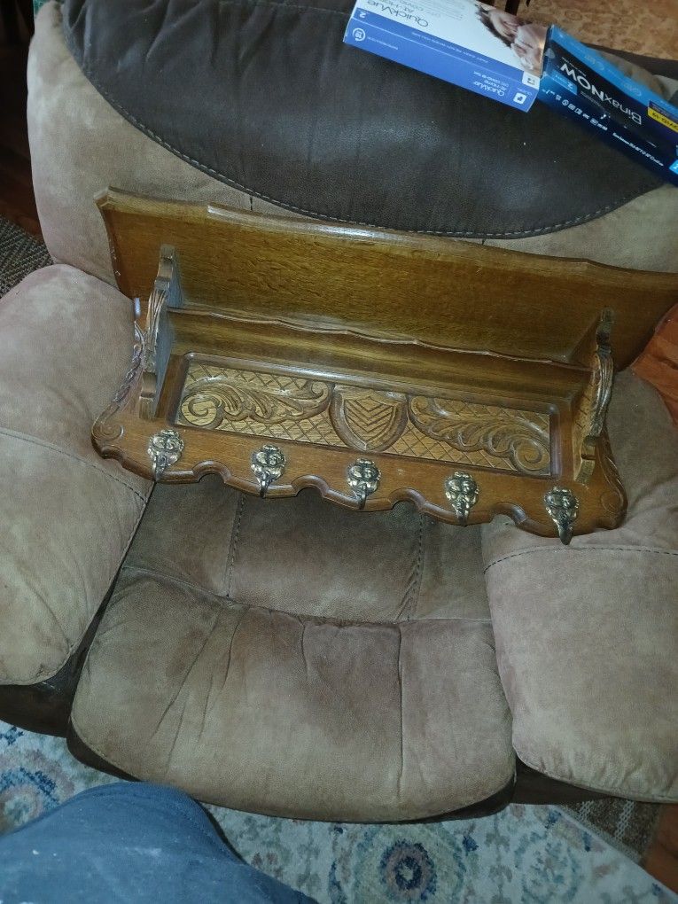 An Antique Wooden Shelf Of Unknown Origin