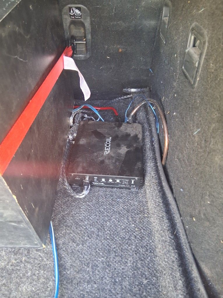 Sub Woofer Amp And A Craftman Tool Box On Wheels With Alot Of Tools