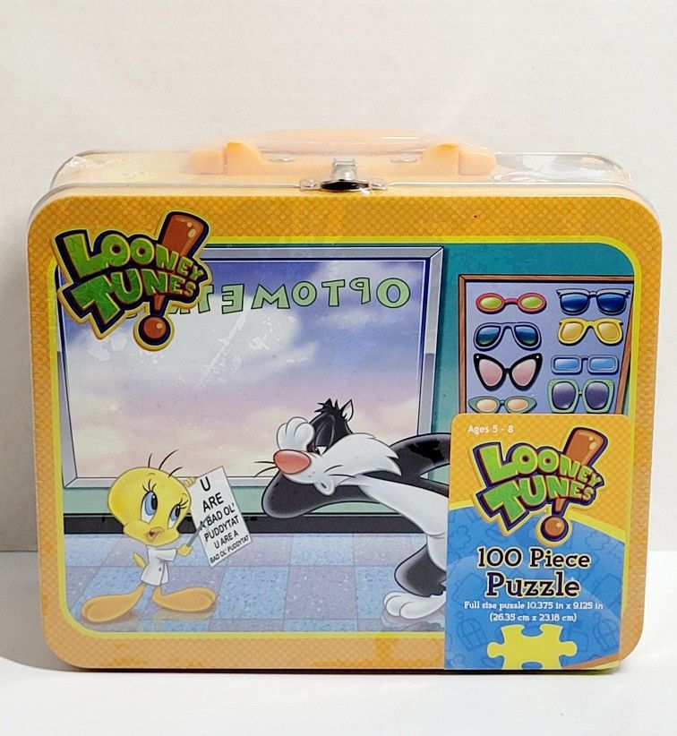 New Sealed 2011 Retro Sylvester & Tweety Collector's Lunchbox W/100 Pc Puzzle. This is a 2011 new sealed 6" X 8" Looney Tunes metal lunchbox featuring