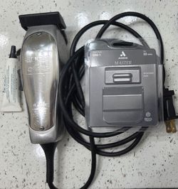 ANDIS MASTER CLIPPER WITH NEW BLADES
