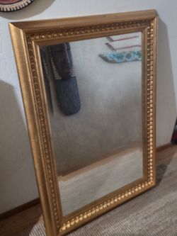 Gold mirror