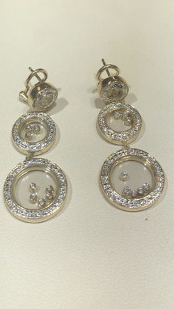 14K Floating Diamond Earrings.