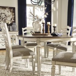 Realyn Chipped White Oval Dining Room Set (SOFA and LOVESEAT