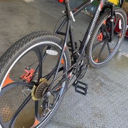 Mongoose Mack Mag Wheel Mountain Bike 26 Wheels 21 Speeds Shimano Revo Twist Shifters Men s Frame Orange White On Black for Sale in Fort Lauderdale FL OfferUp