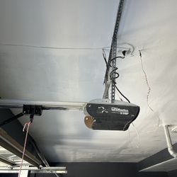 Garage Door Opener Spring Off Track Replace Adjustment And Parts 