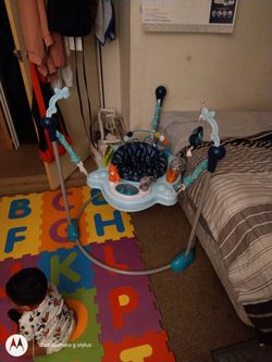 Jumperoo And A Baby Swing
