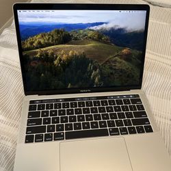 2018 MacBook Pro 13” Intel i5 / 16GB RAM. 