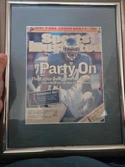 Framed autographed sports illustrated of Jeremiah Trotter