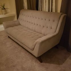 Gray sofa and love seat. Defects listed below. Send Offers