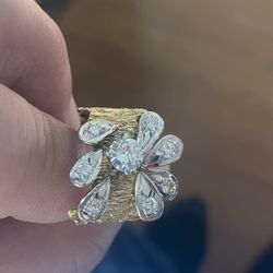 14k Gold - .75 ct Center diamond weighs 11.2 grams 