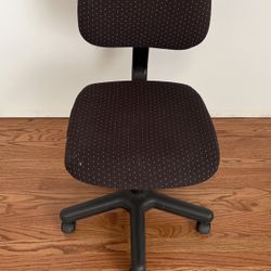 Black Adjustable Office Chair With White Accents