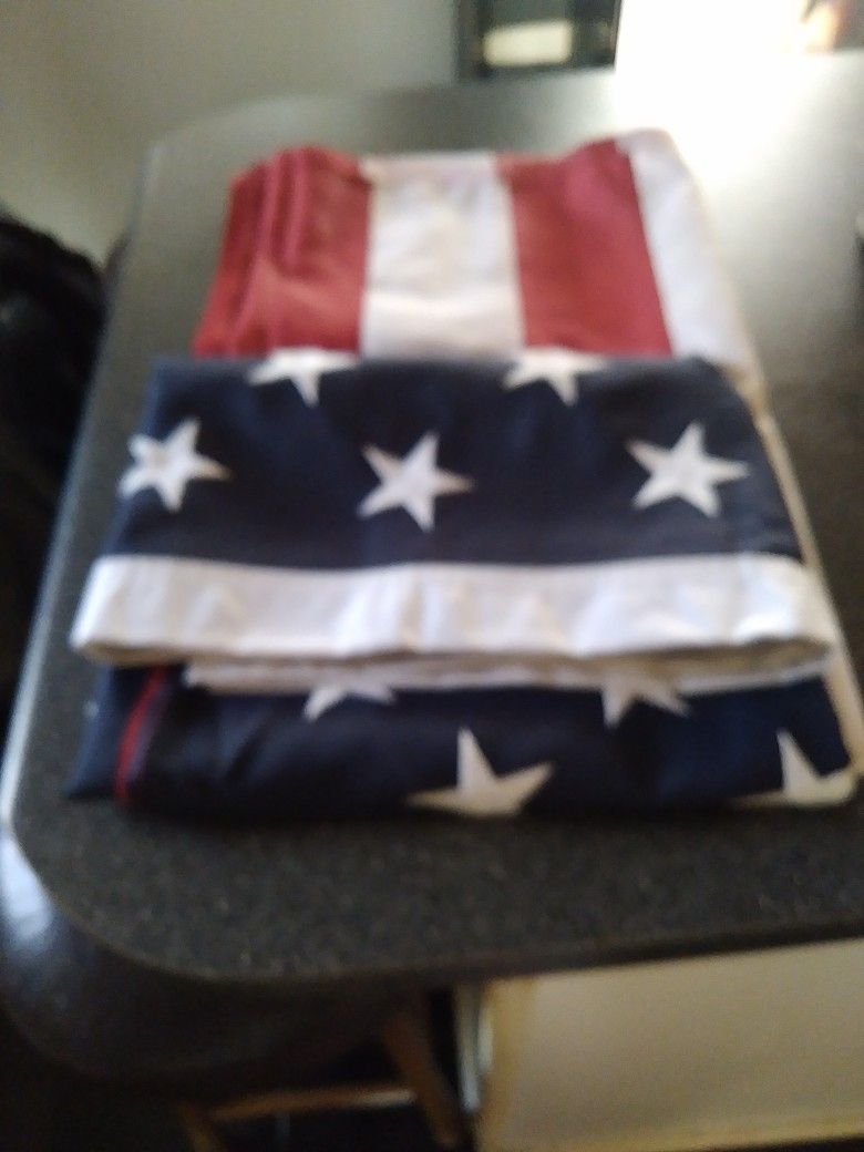 5 X 8. ALL POLIESTER MATIRAL. REENFORCED. CORNERS. REAL BIG FLAG